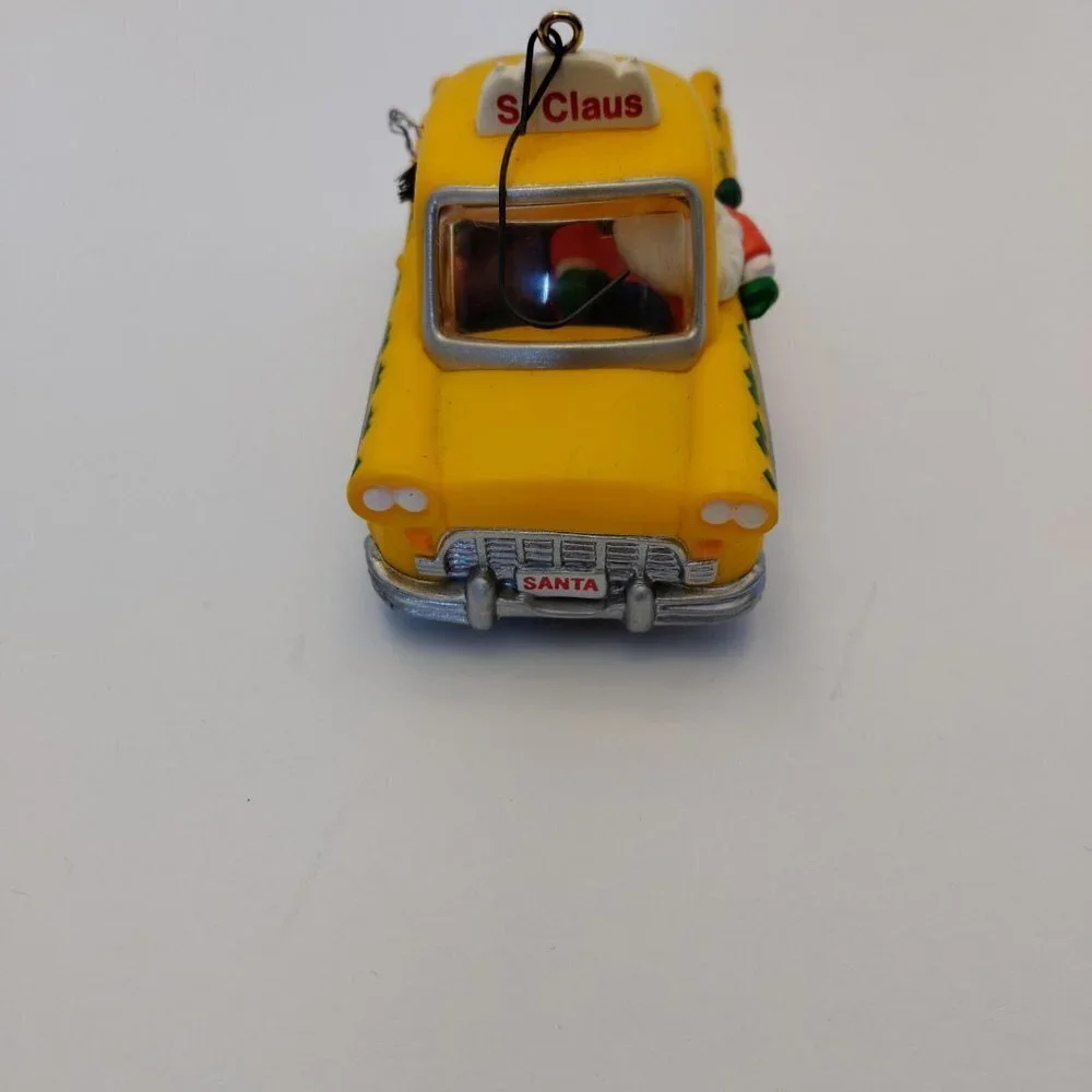 1990 Hallmark Keepsake S. Claus Taxi Ornament